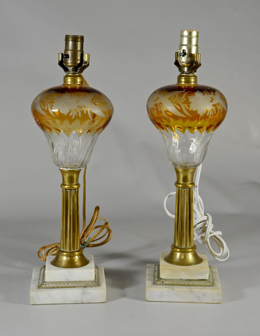 Near pair of amber cut to clear oil lamps with brass (1 of 3)