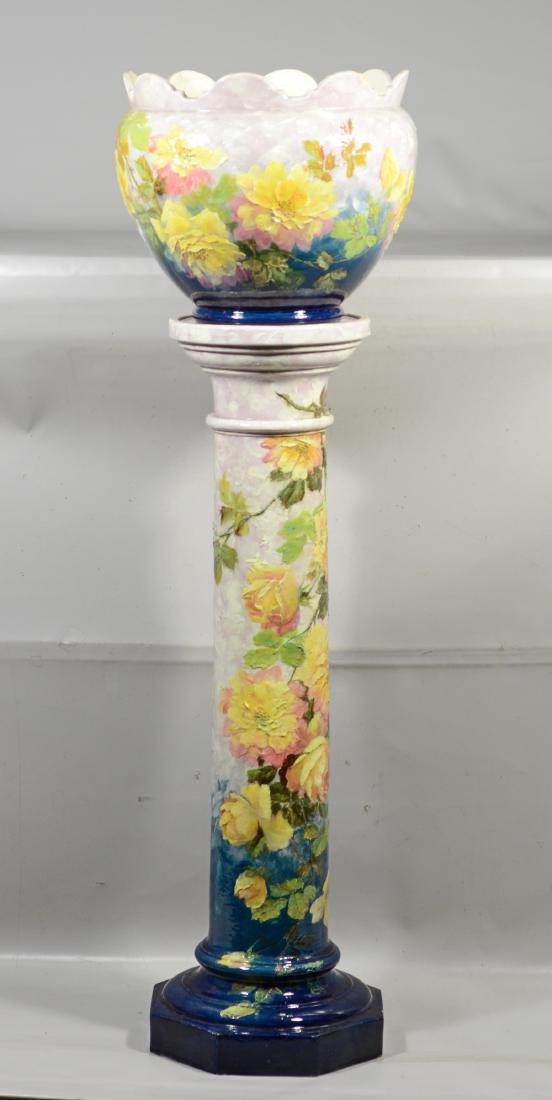 Delphin Massier Vallauris floral decorated jardinier: Delphin Massier Vallauris floral decorated jardiniere and stand, old repair to jardiniere, overall 40" h