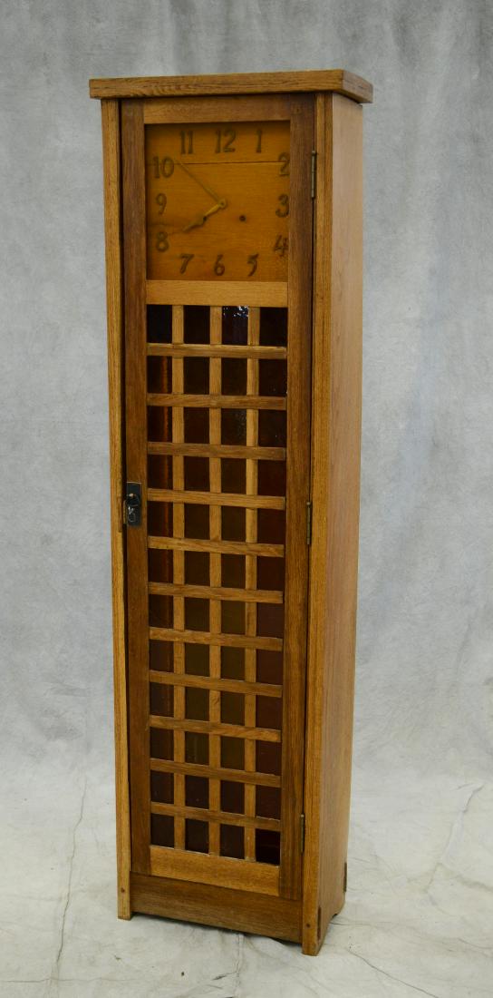 Mission style oak tall clock, Gilbert movement: Mission style oak tall clock, lattice work door, with a Gilbert movement, 72" h, 19" wide
