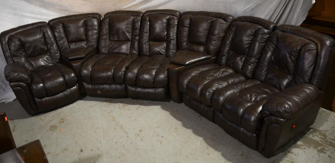 (7) Pc brown leather sectional sofa: (7) Pc leather sectional sofa, brown leather upholstery, remote holder, recliners, wear to leather