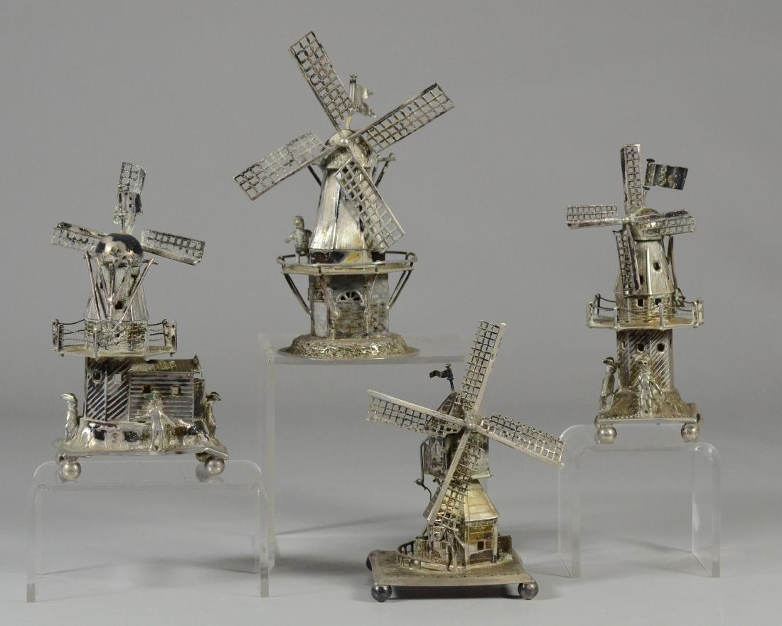 4 Continental silver windmills with various details: 4 Continental silver windmills with various details of figures and structures, tallest 5" h, 8.50 TO