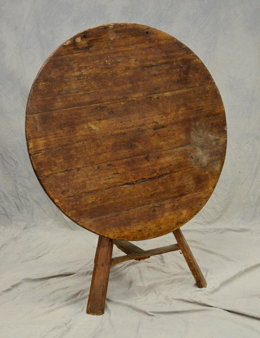 French pine tilt top wine tasting table, 4 board to: French pine tilt top wine tasting table, 4 board top, triangular base, 18th/19th c, 30"h x 42"diameter
