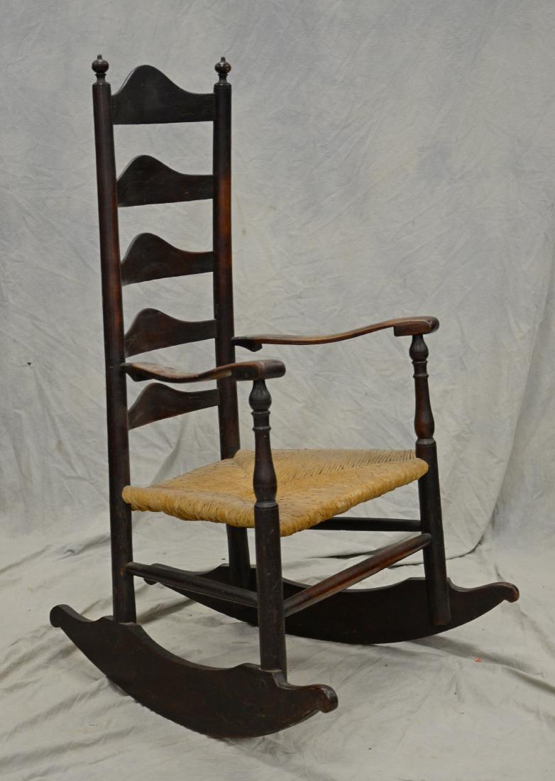 5 slat ladderback rocking chair, rush seat: 5 slat ladderback rocking chair, rush seat, pegged frame, cheese cutter rockers, wear to finish, one slat needs repair, 45" h x 28-1/2" w x 31" d
