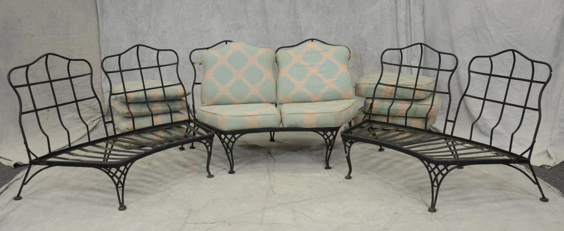 (3) Wrought iron settees: (3) Wrought iron settees, shaped and rounded cage backs, steel slatted seats, can be used singly or joined as a group, with cushions, extreme width 48" , 33" h, no makers marks, 500, Collection of Dor