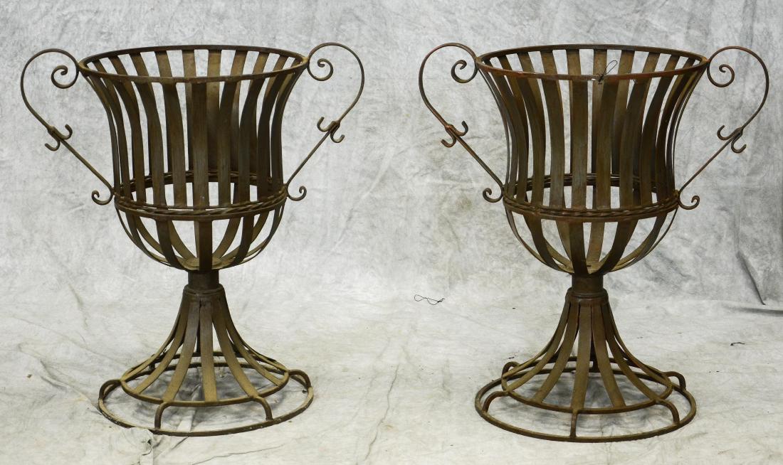 (2) Iron handled basket planters (1 of 1)