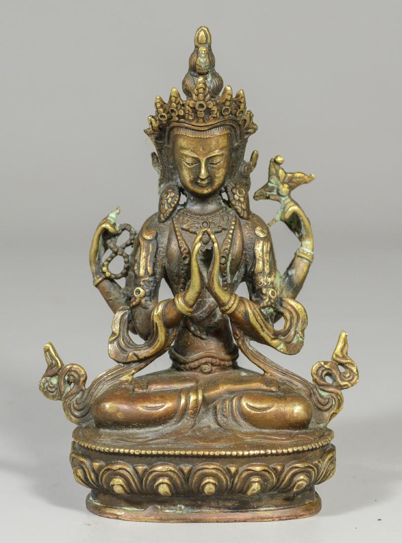 Tibetan style brass figure of a Buddha (1 of 2)