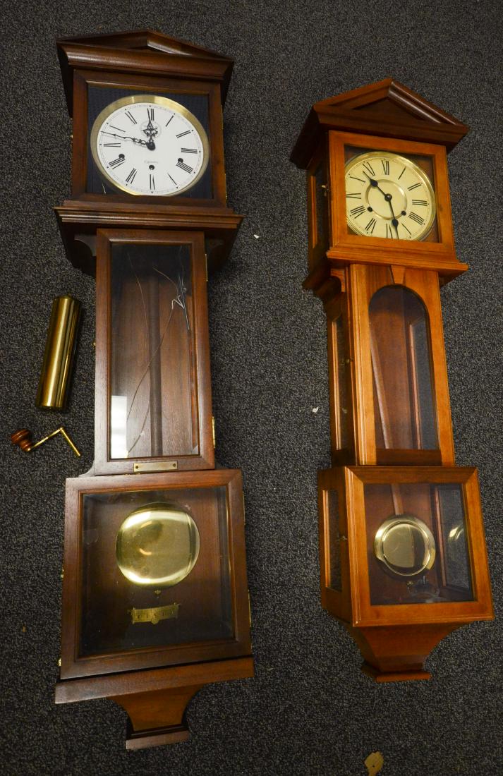 (2) Lantern style wall clocks: (2) Lantern style wall clocks, one 31 day time and strike movement, one with an 8 day and time and strike and Westminster chime, single weight, complete with original key, good condition, largest 45"