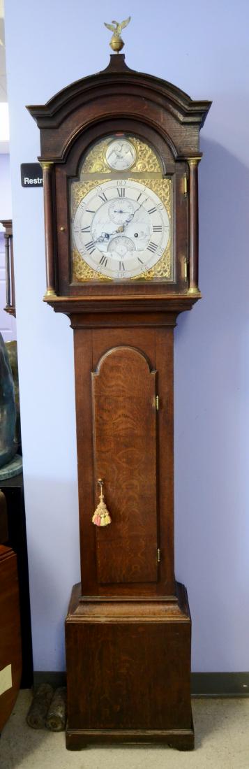 Joseph Miles, Shaston, England, tall case clock: Joseph Miles, Shaston, England, tall case clock, 8-day, time and bell strike weight-driven movement, in an oak case, with full columns flanking the dial, tombstone-shaped trunk door, resting on bracke