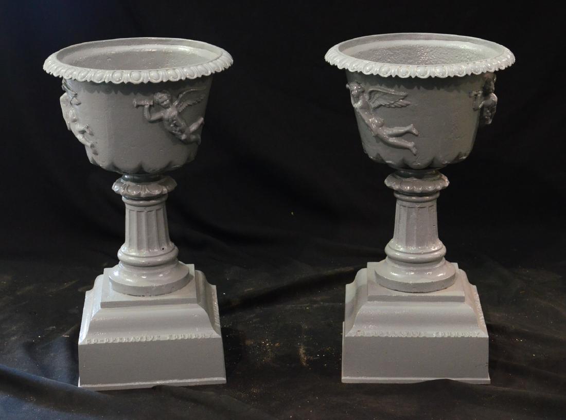 Pr cast iron planters, the bowls decorated with angels (1 of 1)