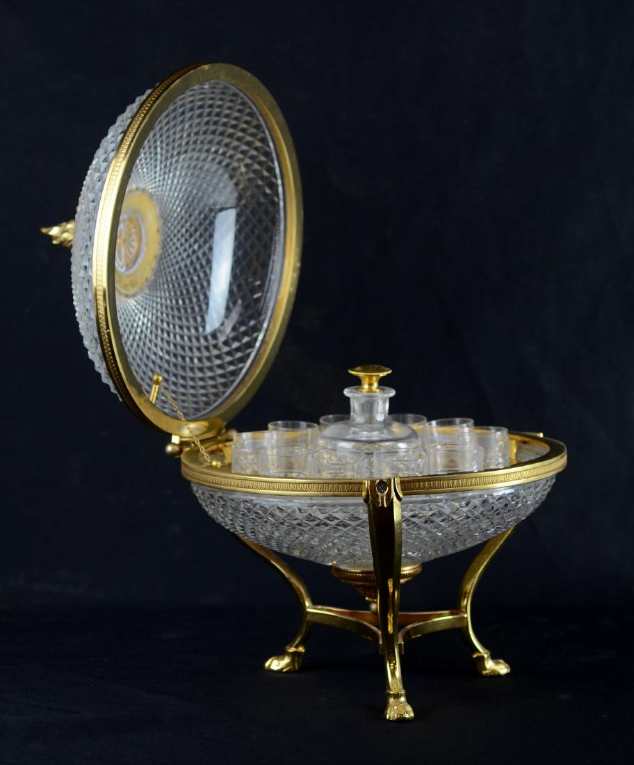 Round gilt brass mounted cut crystal tantalus (1 of 4)