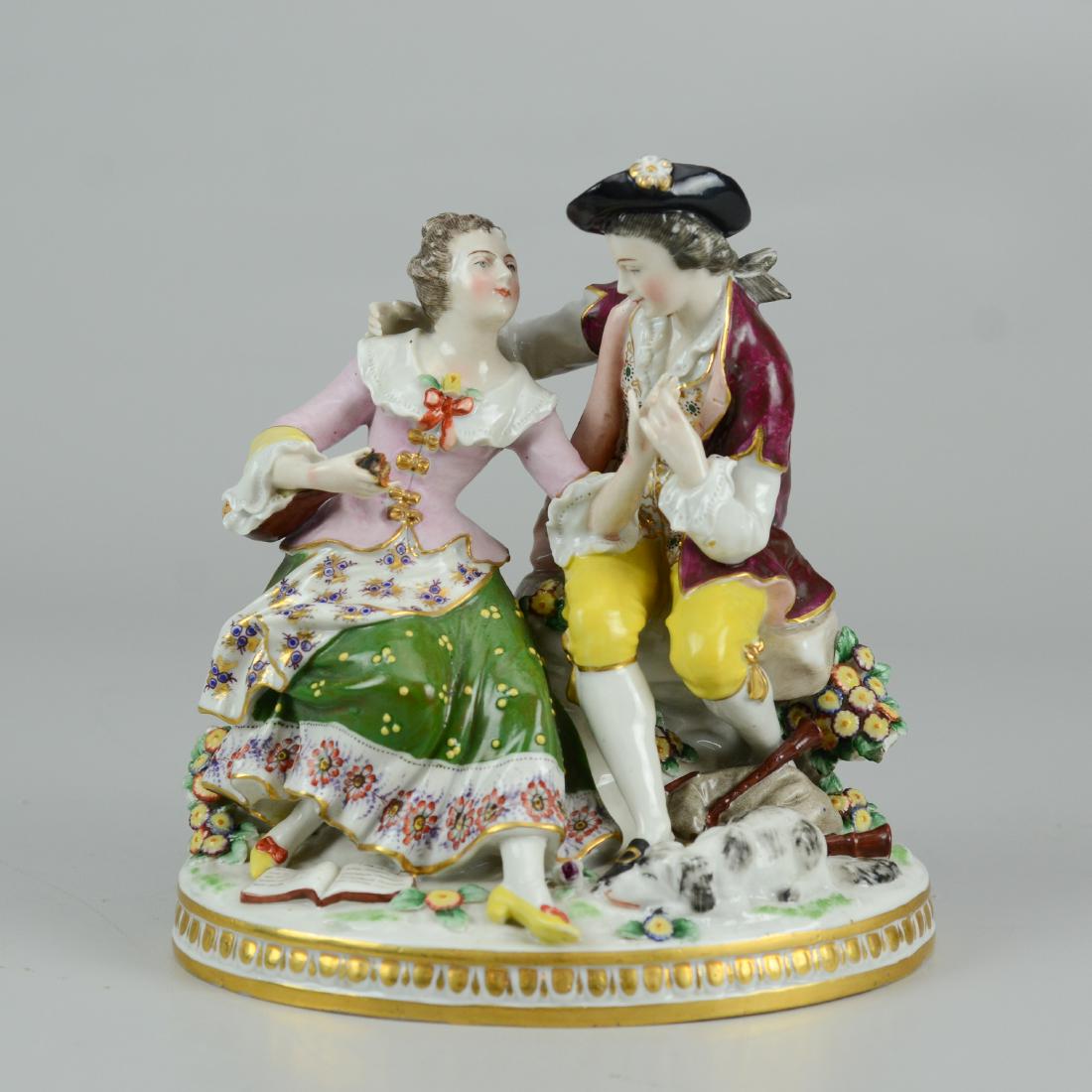 German porcelain courting couple figurine: German porcelain double figurine, courting couple, man with bagpipes, woman with lute, 7-1/4" h x 7" w