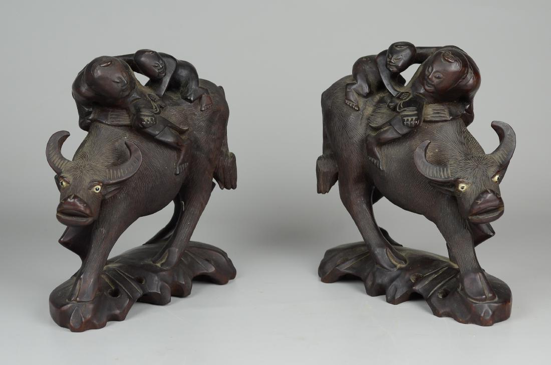 Pr Chinese carved wood figures astride buffalo, 9" h (1 of 2)