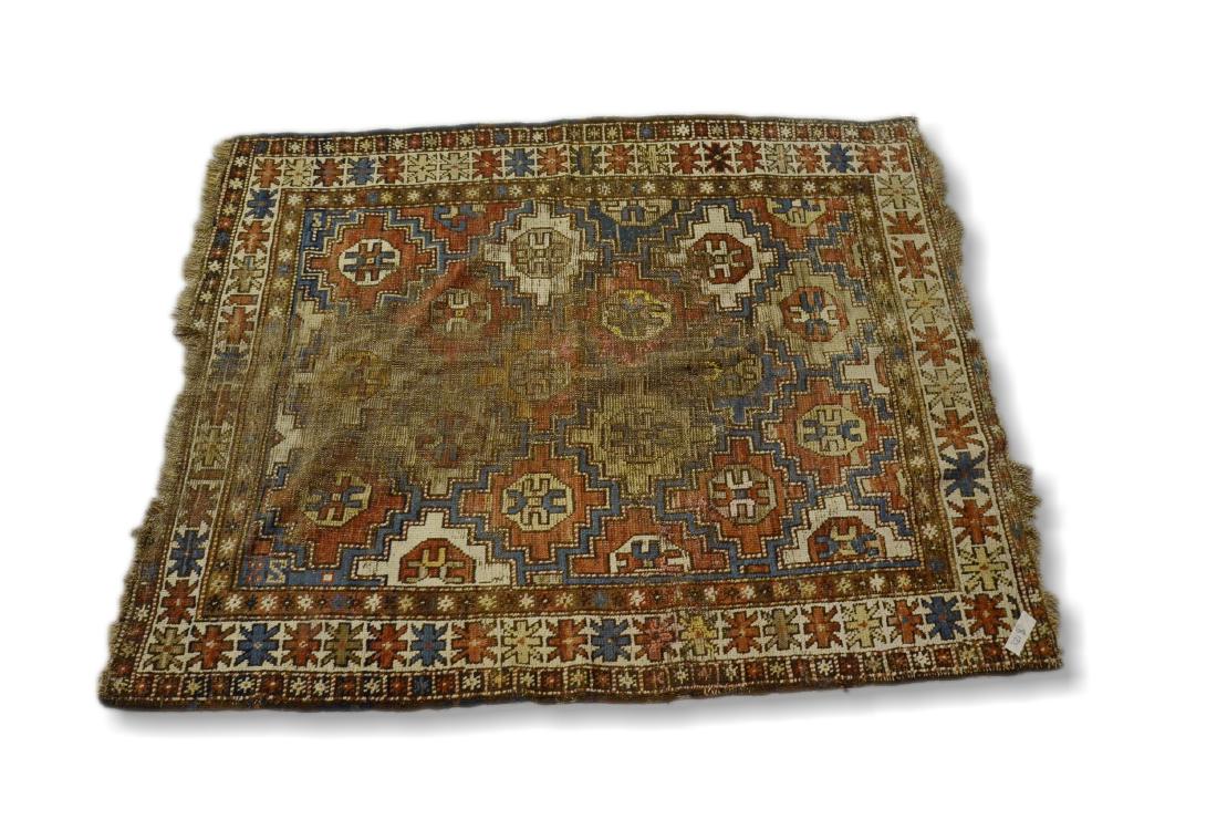 3'10" X 4'8" Kazak: Circa 1910's Kazak rug 3'10"x4'8". Loss of ends and major wear in field.