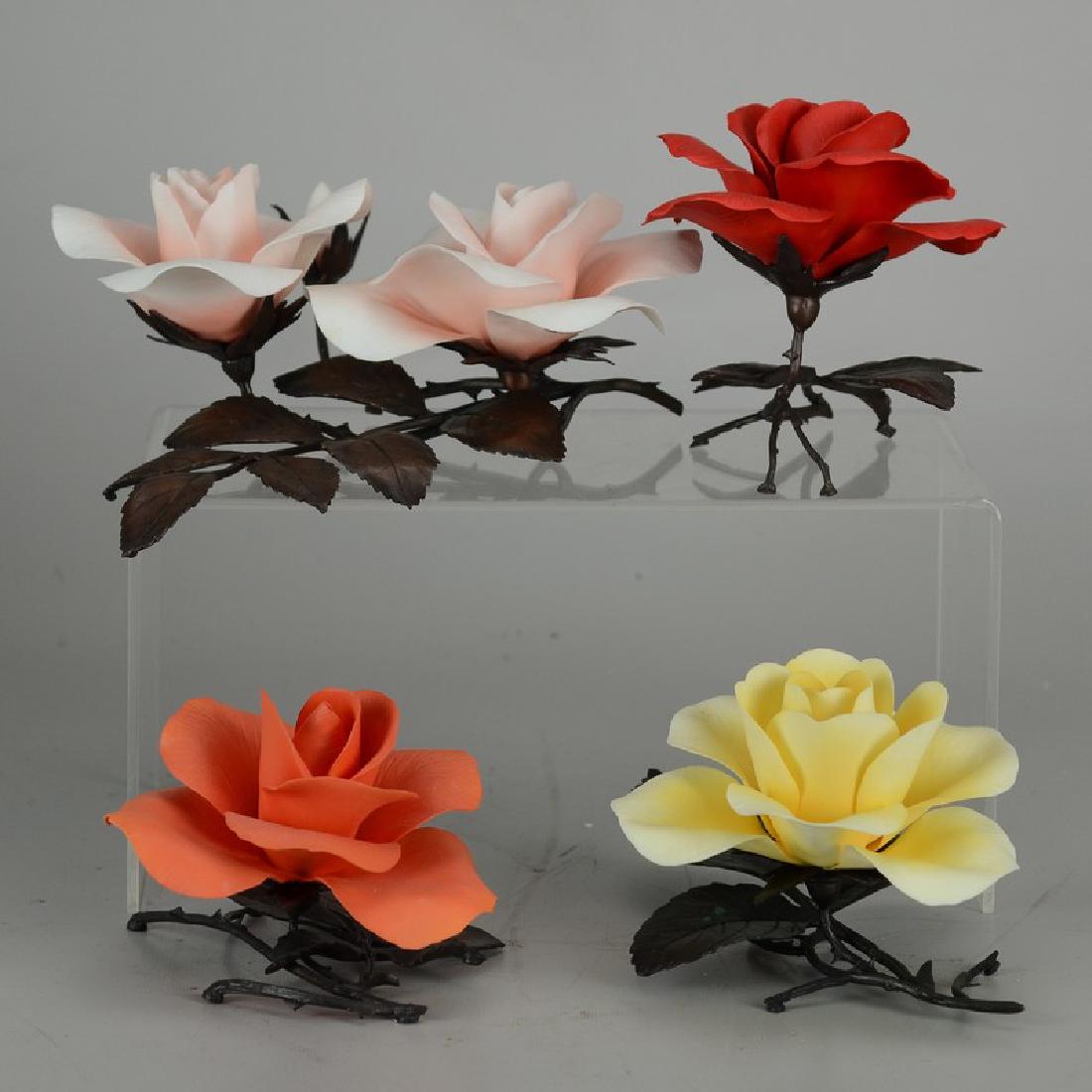 (4) Boehm Porcelain & Bronze Rose Figurines: (4) Boehm porcelain roses with bronze leaf mounts, largest 8-1/2" l