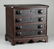 Walnut 4 drawer miniature chest, American, 19th c