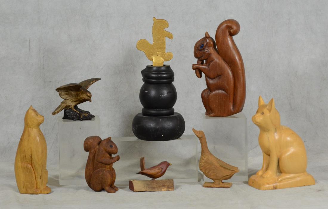 (8) Wooden Pieces: (8) Carved wooden pieces:; 2 cats, 2 birds, goose, 2 squirrels, and wood piece with painted squirrel finial, tallest 11-1/2"