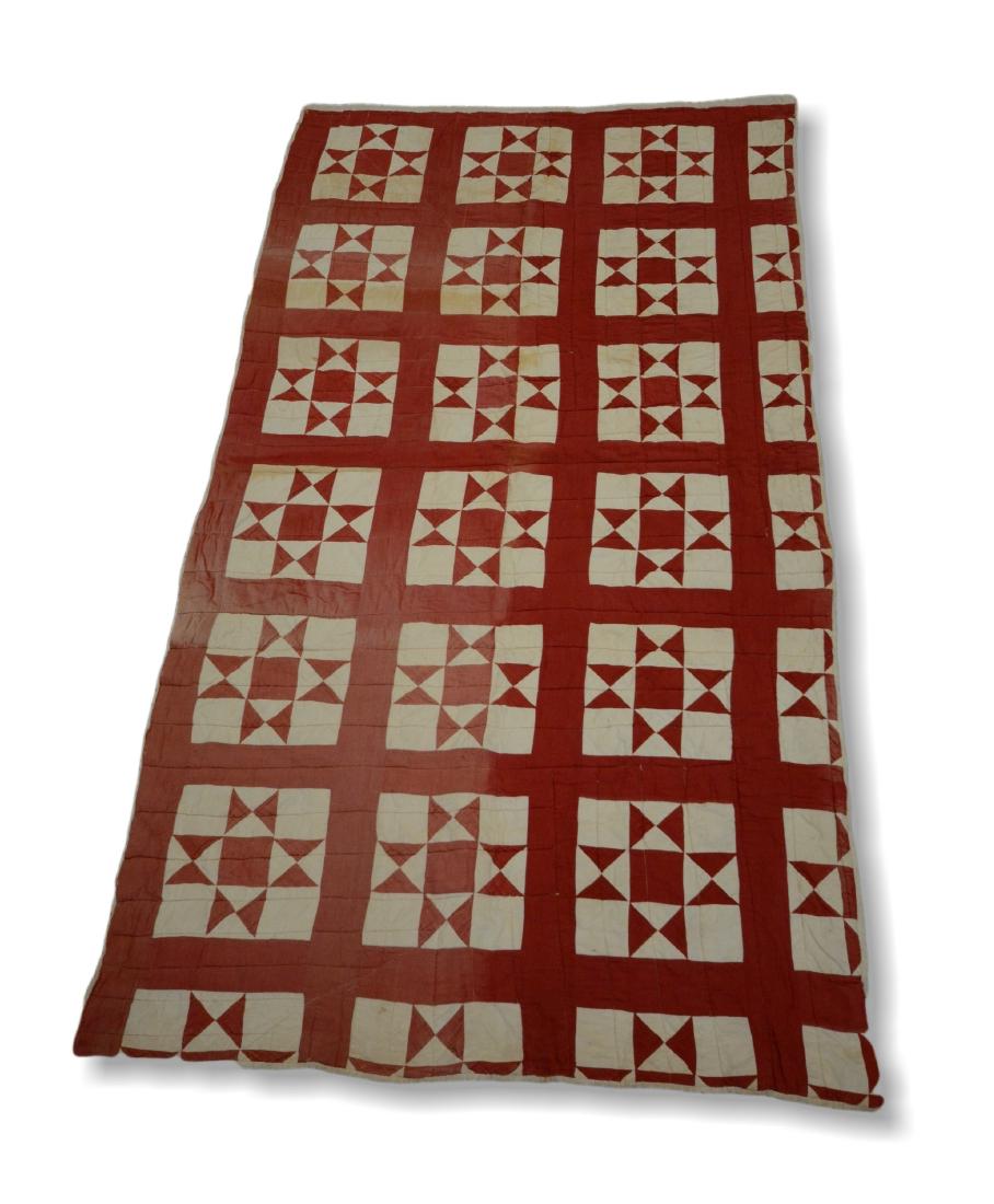 Geometric quilt & iron farm tool (1 of 4)