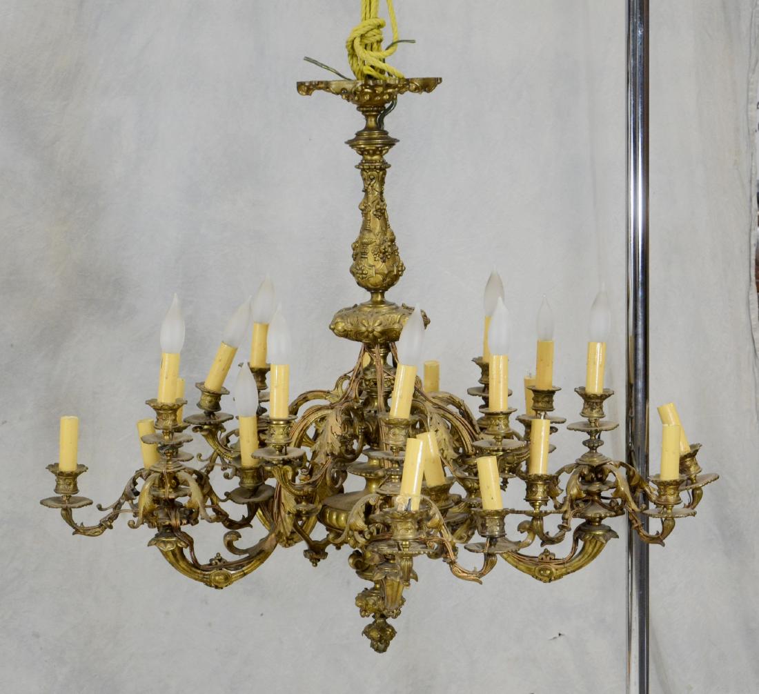 Rococo cast bronze 10-arm chandelier: Rococo cast bronze 10-arm chandelier, 25-light, foliate and C-scroll arms, 34" dia x 33" h