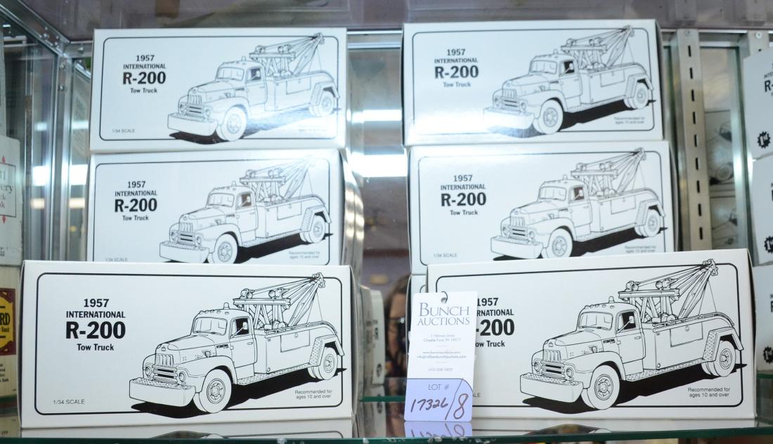 Shelf #76 - (8) First Gear 1957 International R-200 Tow: Shelf #76 -(8) First Gear 1957 International R-200 tow trucks in original boxes