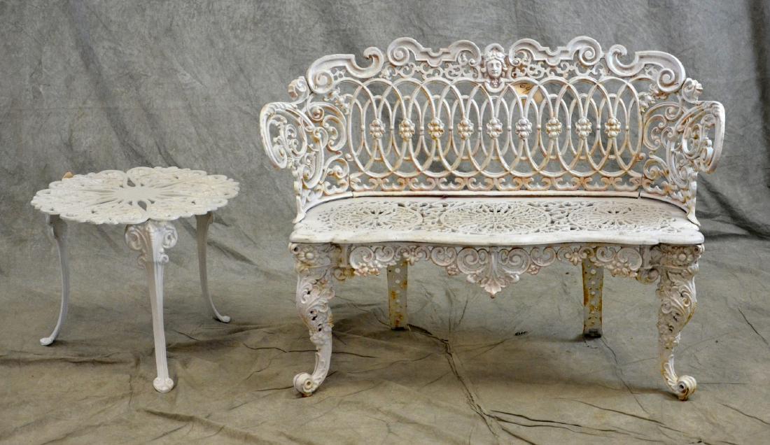 (2) Cast Iron love seat and side table (1 of 1)