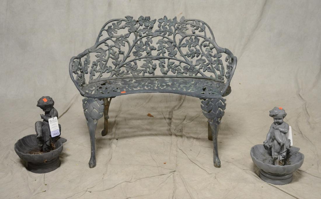 Metal leaf form garden bench, Pair Winterthur Cherub (1 of 2)