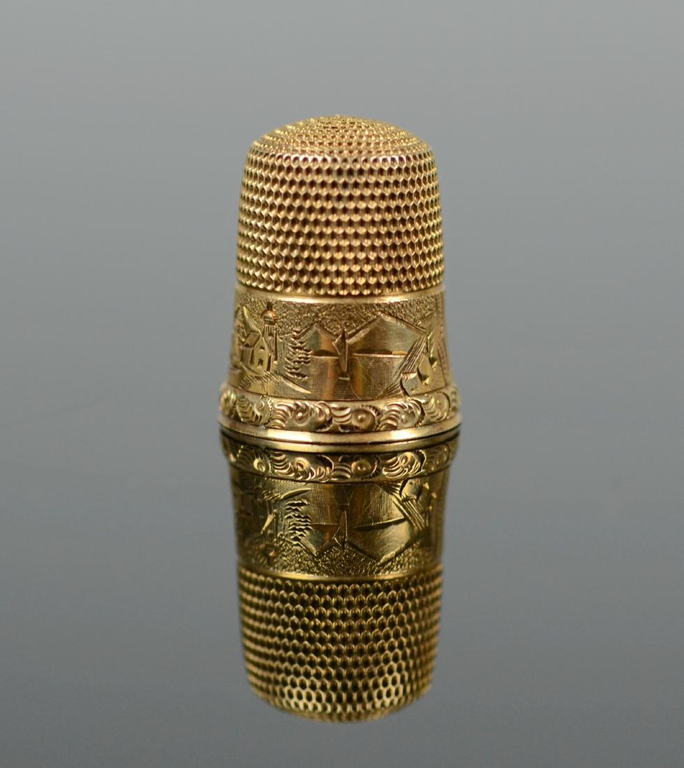 14K YG Thimble: 14K YG thimble, engraved with village scene, 3.0 dwt