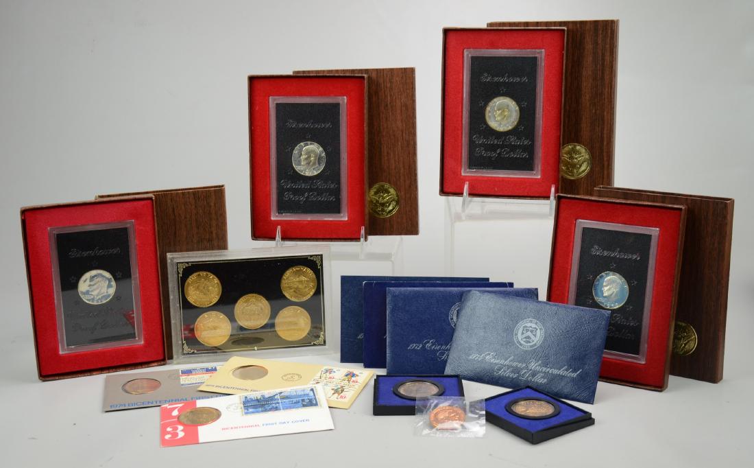 U.S. Commemorative Coins: (4) 1971-1974 Eisenhower Proof Dollars, (4) 1971-1974 Eisenhower UNC Silver dollars, (3) Bicentennial 1st Day Coins, (2) 1972 GW American Revolution Medallions, 5 Pc Coins of Hawaii Set, Regan Medalli