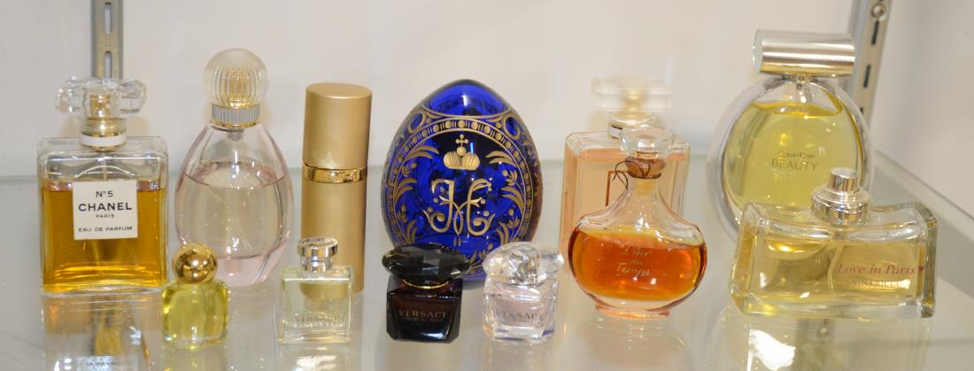 Shelf #83- Chanel and Misc. Perfume Grouping: 12 pc Vintage and contemporary perfume grouping to include Chanel No. 5ml bottle, Chanel Coco Mademoiselle, 1940's Nina Ricci L'Air du Temps in Lalique bottle, Nina Ricci Love in Paris, Calvin Klein B