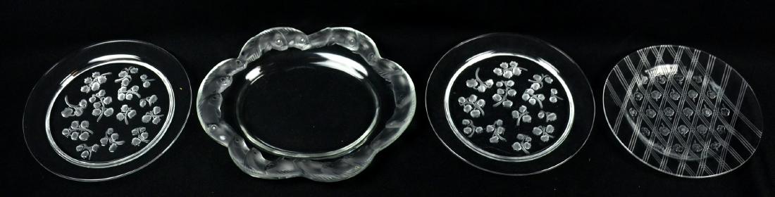 (4) Lalique Crystal Dishes: (4) Lalique frosted & clear crystal dishes, c/o (2) Muguet Lily of the valley 8-1/4" plates, Piriac oval fish tray, 10-5/8" x 9-1/4", lattice & flower 7-3/4" plate, #183, 191, 192, 193