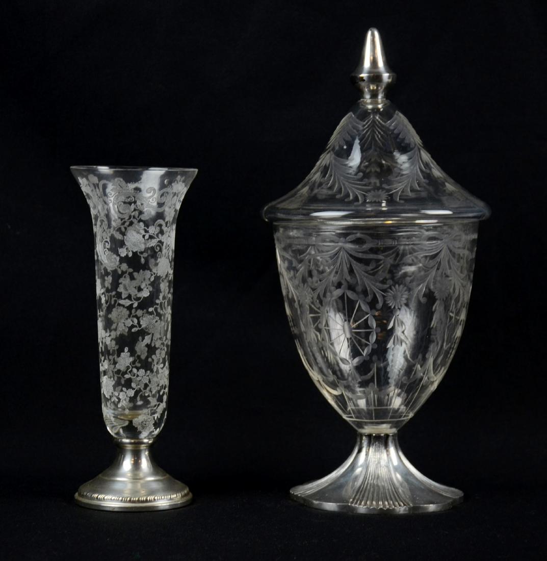 (2) Etched Glass Items with Silver Mounts: Sheffield Silver Co etched glass bud vase with weighted sterling silver base, 8-1/2" h, Intaglio cut covered candy jar or urn, originally Pairpoint, with silver plated foot & finial, 12" h