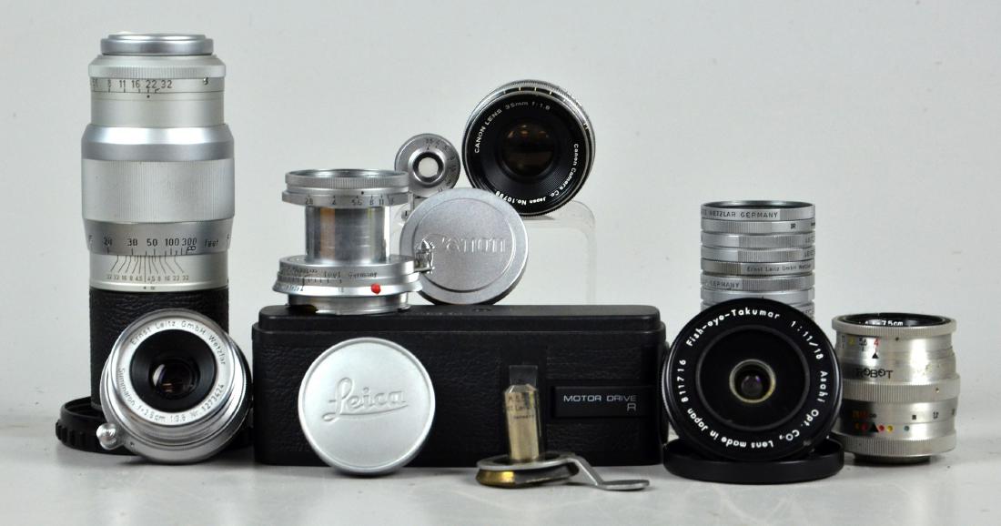 (20) Leitz/Zeiss Leica Lenses and filters, etc.: Ernst Leitz GmbH Wetzlar Summaron f=3.5cm 1:3.5 bayonet mount lens in hard plastic case. Ernst Leitz GmbH Wetzlar Hektor f=13.5cm 1:4.5 screw mount Leica zoom lens with Leica brand lens cap and hard p
