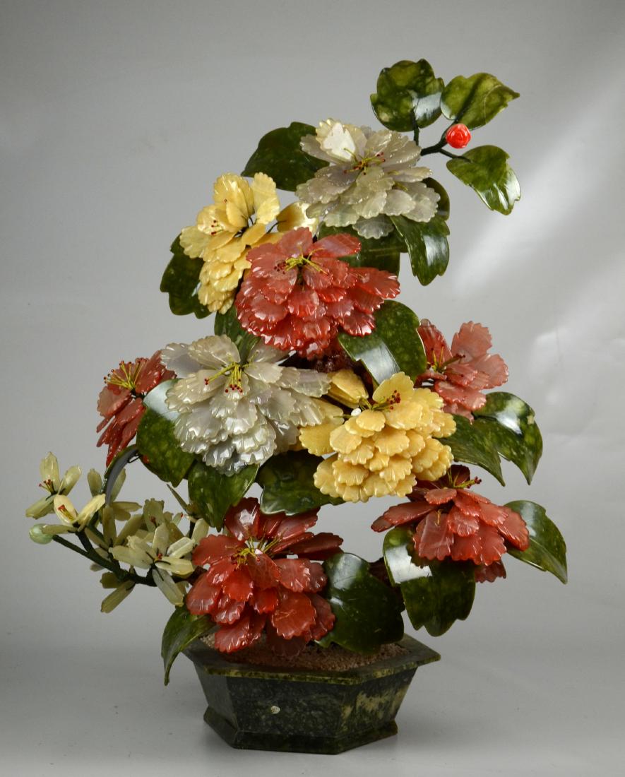 Large Floral Jade Tree: Large stone flower arrangement in marble planter, 25" h, on a wood platform, 10" x 8-1/2" x 2" h, #215