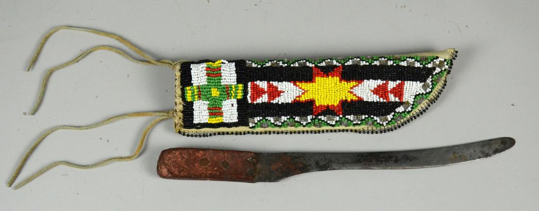 Early Great Plains Native American beaded knife sheath: Early Great Plains Native American beaded knife sheath with vintage knife, Mandan indian tribe, North Dakota, blade marked "WILSON SHEAR STEEL, SHETFIELD ENGLAND" with an "X" next to a diamond hallmar