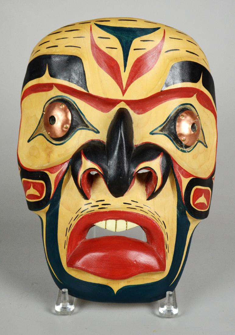 Northwest Coast portrait mask - Stomish (John Gibson): Northwest Coast portrait mask by Stomish (John Gibson), Nanaimo, BC, carved wood with polychrome paint and copper eyes, reverse side signed "Stomish, Y2K, KUL-KA-LEETH," 11-5/8" L, Artist Bio: John Gi