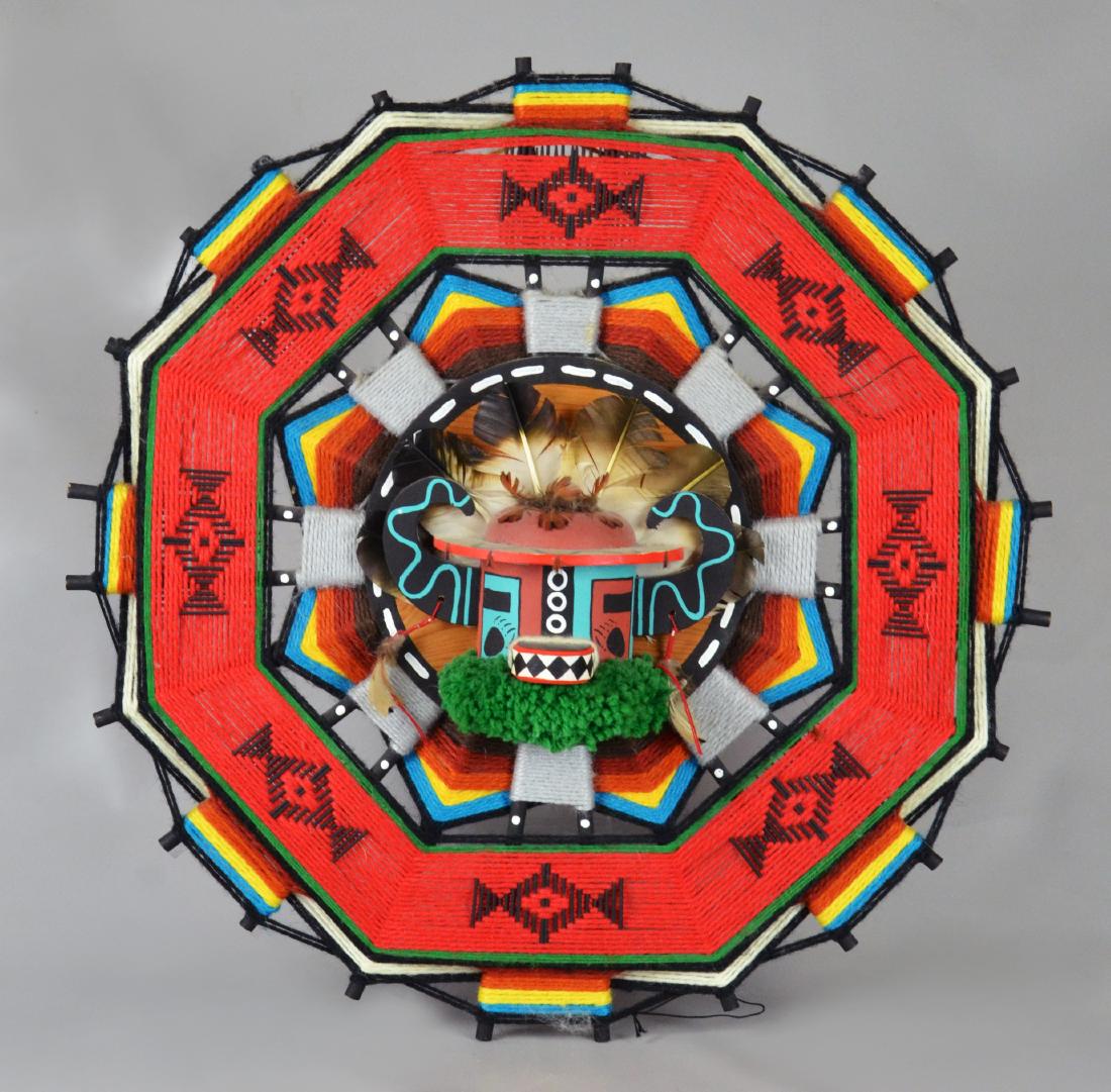 Hopi Native American Badger Kachina Wall Hanging: Hopi Native American Badger Kachina Wall Hanging, signed 'Sandra (Hamana) Davis, Old Oraibi Village, Hopi Tribe, 84.' Wood with polychrome paint, feathers & yarn, 24" diameter