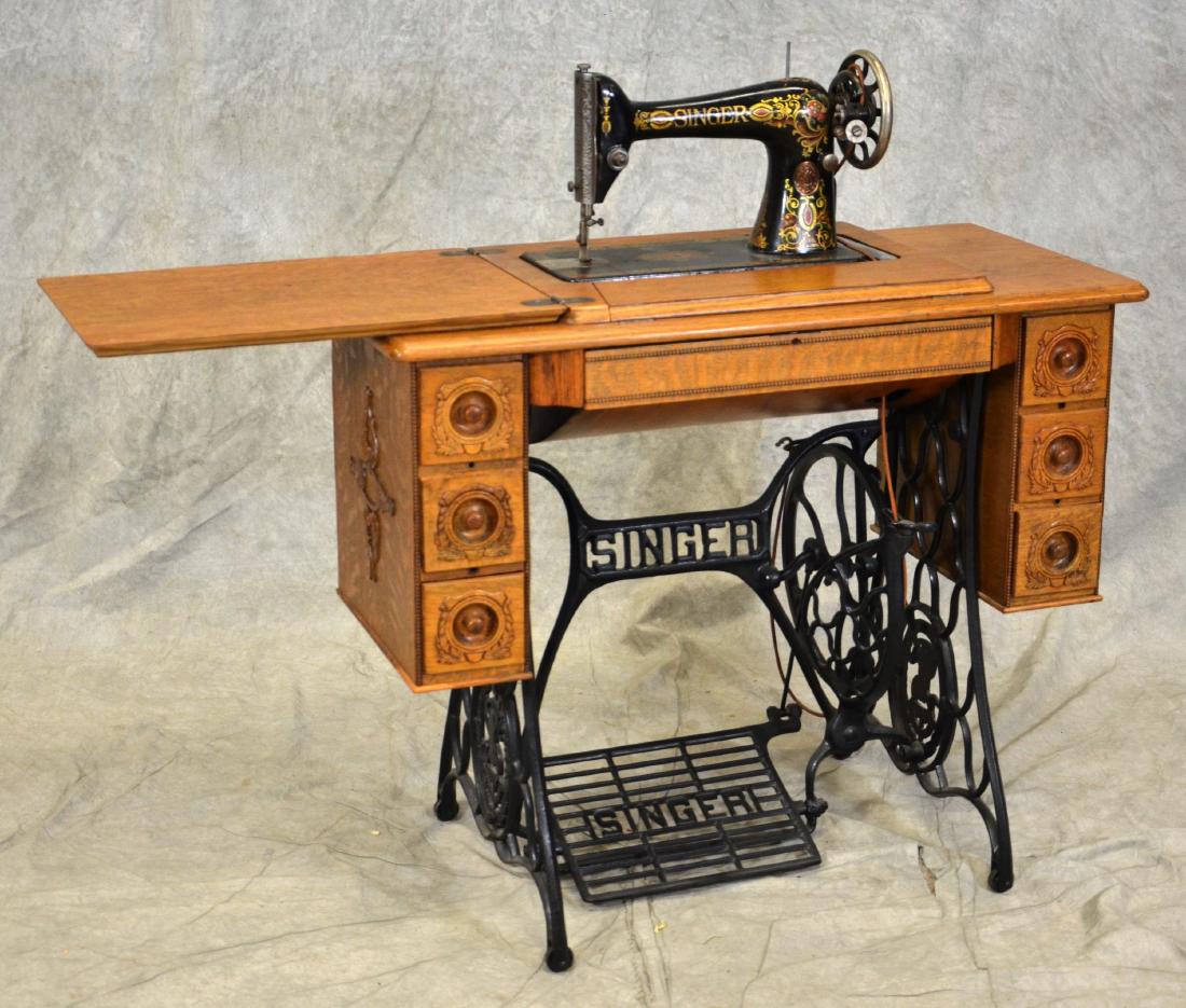 Oak Singer Sewing machine: Oak Singer Sewing machine, iron base, Serial # G6259562, 35" w
