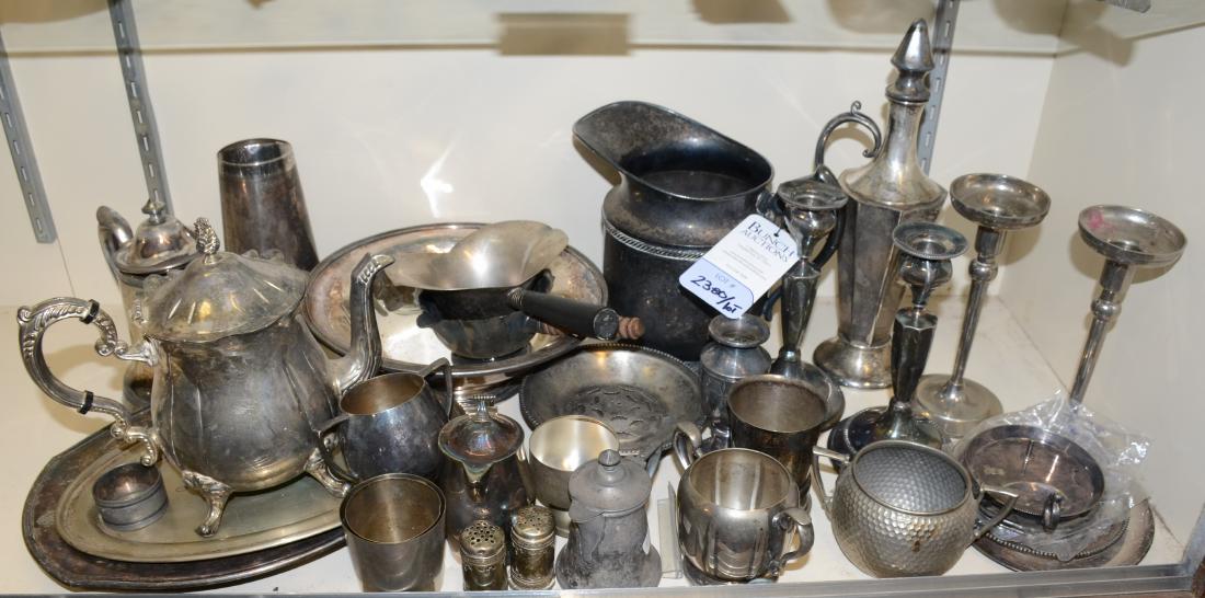 Shelf #80 - Silverplate Decor and Serveware: Shelf #80 - Silverplate decor and serveware to include a Poole Silver Co. pitcher, two pairs of candlesticks, a Sheffield ewer, S.L. & G.M. Rogers teapot, Wm. Roger creamer, Wallace footed bowl, a pai