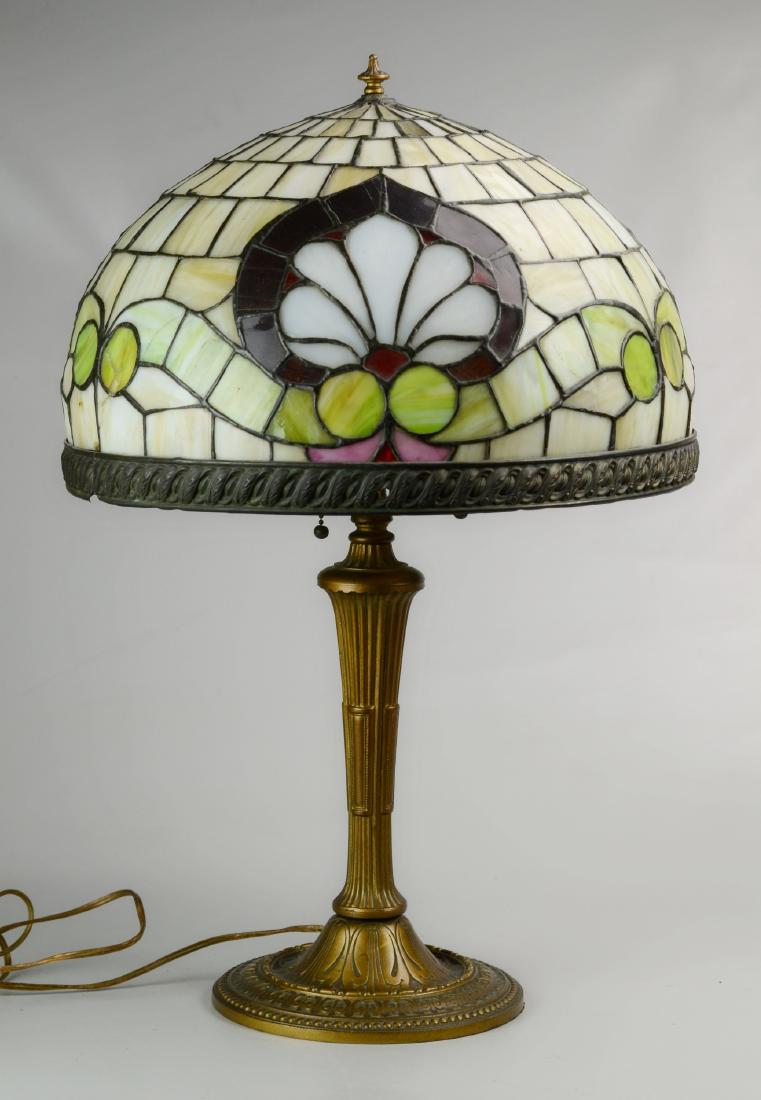 Stained Glass Table Lamp: Stained glass table lamp, shell pattern shade, gilt metal column form base, 24" h x 16" dia