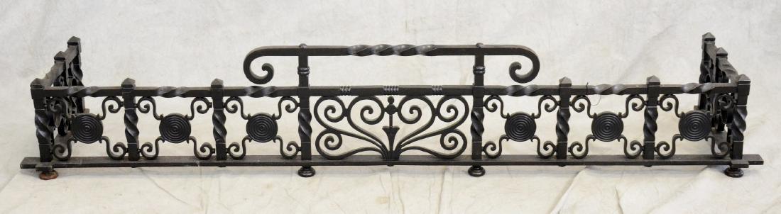 Art Nouveau black iron fireplace fender: Art Nouveau black iron fireplace fender, black iron with scroll decoration, 10 1/2"h x 52"w x 11"d