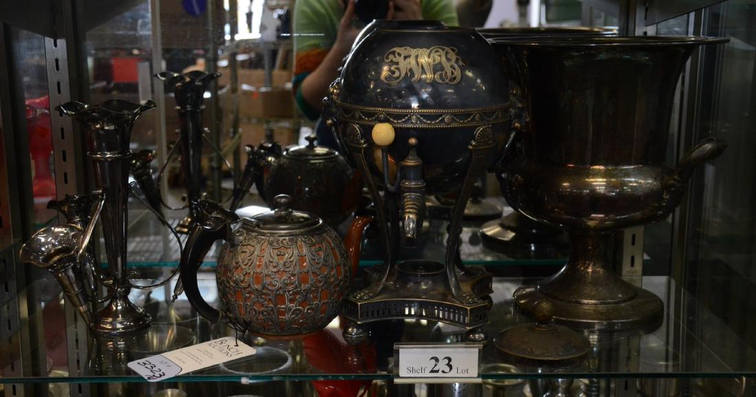 Shelf #23 - Silver Overlay Teapot, Silverplate: Shelf #23 - Silverplate serveware and decor to include: Gorham silverplate coffee urn featuring garland detail, lion head handles, and clawed feet on a reticulated base, monogrammed; Poole silverplate