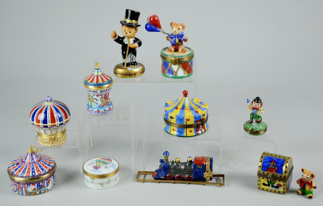 (10) Circus Related Trinket Boxes: (10) Circus related dresser boxes, including Limoges, Staffordshire Enamels, tallest 3-3/4" h, bear missing something from his hand