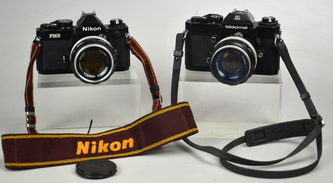 (2) Nikon 35mm SLR Cameras: Nikon FM2n with Nikkor-S Auto 1:1.4 f=50mm lens, in great condition. Nikkormat EL with Nikkor-S Auto 1:1.4 f=50mm lens, in great condition. 4"x6"x4 3/4"