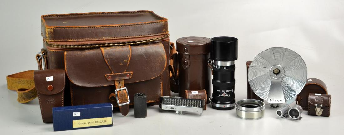 Nikon Rangefinder Accessories and Leather Camera Bag: Nikon branded leather camera bag with Nikon/Nikkor rangefinder accessories. Nikkor qc 1:3.5 f=3.5cm lens, shoe mount flash, 3.5cm turret viewfinder, wire release, light meter, 13.5 cm turret viewfinde