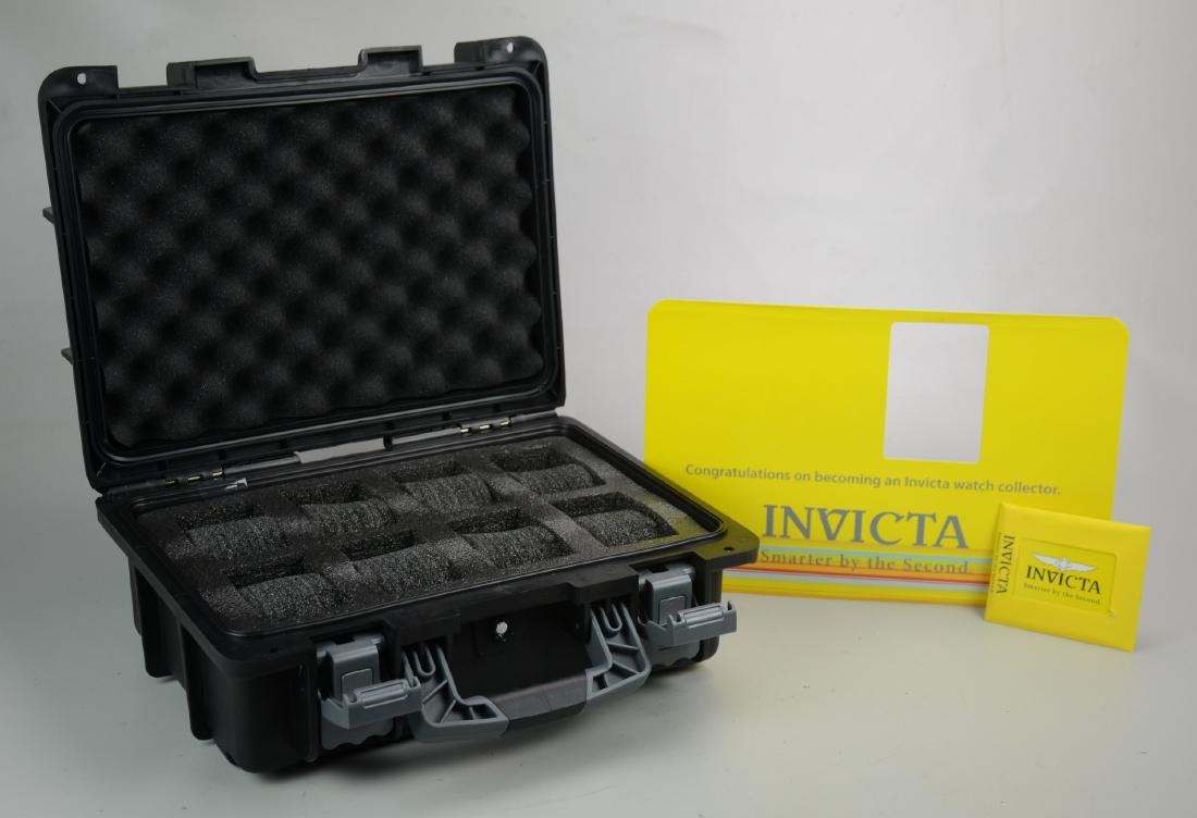 Black Invicta Wristwatch Collector Box: Black Invicta collector box, holds eight wristwatches in large individual slots, double latch closure, 15" x 12" x 6-1/2"