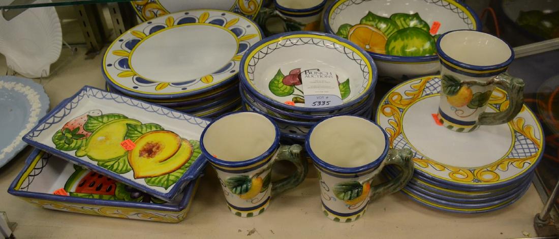 Shelf #35 - (25) Pcs Pottery Dinnerware: Shelf #35 - (21) Pcs Moramica Louie Cidalia lattice & scroll pottery dinnerware, c/o 6 dinner plates, 6 salad plates, 6 soup bowls, round serving bowl, 2 open casseroles, and (4) Pacific Rim mugs