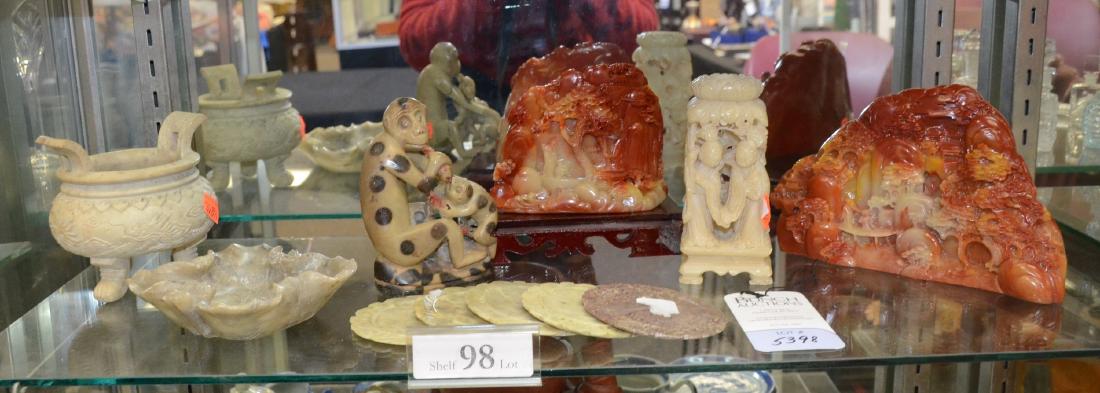 Shelf #98 - (11) Chinese carved stone pieces: (11) Chinese carved stone pieces, c/o monkeys 5-1/2" h, women under lotus 5-1/2" h, (2) dioramas with stands, 8-3/4" w x 5-1/2" h, 5-1/2" w x 4-1/2" h, (7) censer 4-3/4" h, bowl 4-3/4" sq, (5) round t