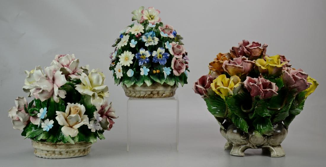 (3) Large Capodimonte Floral Centerpieces: (3) Large Capodimonte floral arrangement centerpieces, largest 13" h x 15" dia, some chips to flowers, but overall good condition