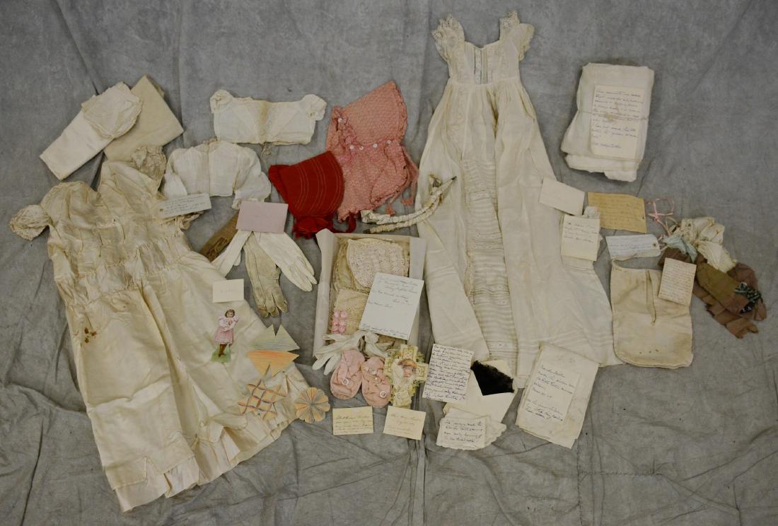 Edwardian Ephemera, Clothing and Children's Items: Grouping to include two Edwardian cotton bonnets, a childs christening gown, several lace and embroidered childrens bonnets, (3) Edwardian childrens bodices, (5) cotton childs antique slips/sleep dres