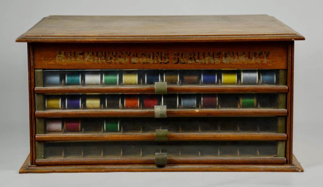 Hemingway Advertising Spool Cabinet: 4-Drawer spool cabinet, "M. Hemingway & Sons Sublime Quality", glass front drawers with metal pulls, 20-1/2" w x 17-3/4" d x 10" h, wear to lettering, one side has split in panel