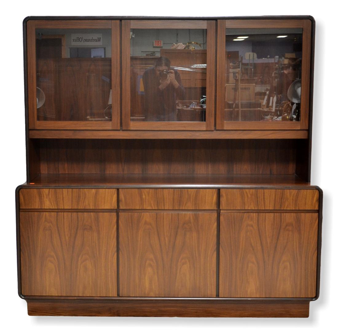 Brouer Mobelfabrik Rosewood 2-pc China cabinet: Brouer Mobelfabrik Danish Modern Rosewood 2-pc China cabinet, hutch with three glass doors, lighting underneath, sideboard portion with three drawers over three doors, interior shelving, 72"h x 70-1/2